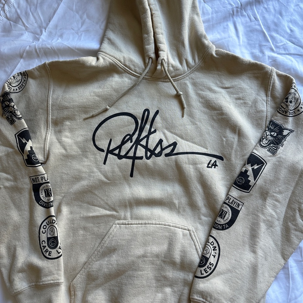 Young & Reckless Cream Sweater with Bold Graphic Design